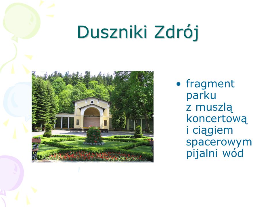 Duszniki Zdrój fragment parku z muszlą koncertową i ciągiem spacerowym pijalni wód.